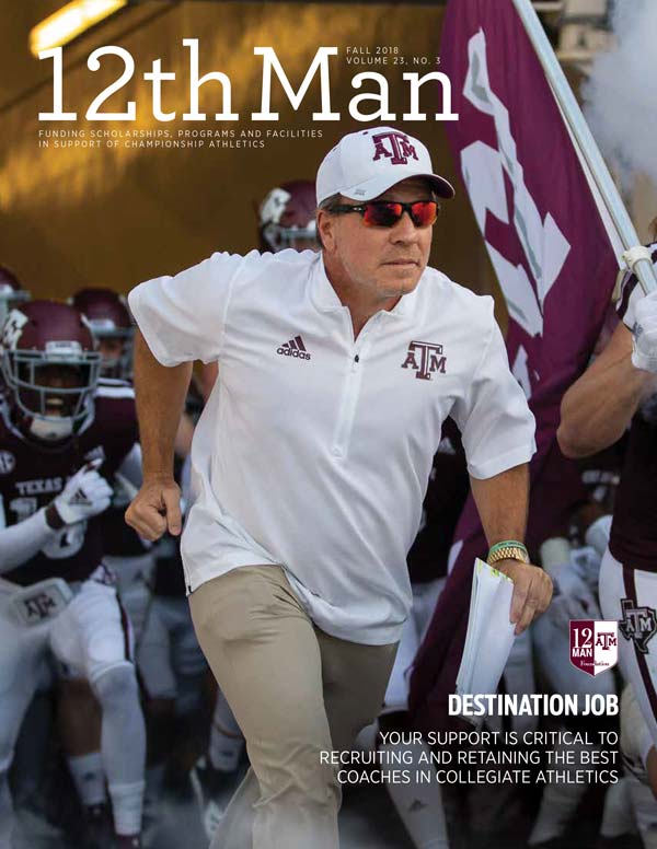 Jimbo Fisher running out onto the field with the players