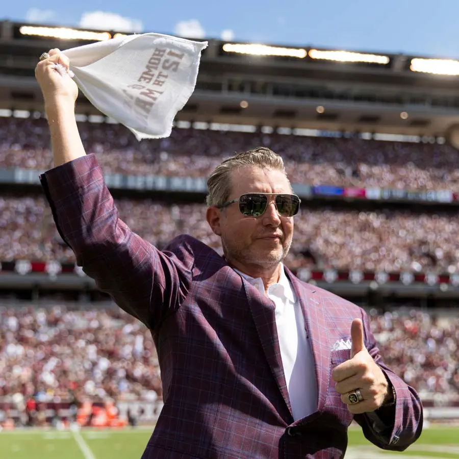 David Coolidge waving flag
