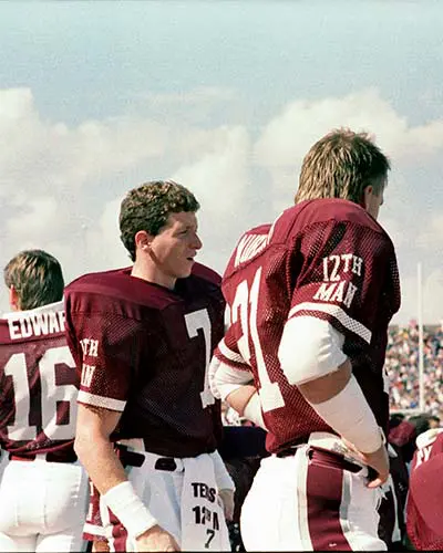 Portrait of Adam Sinn shaking hands