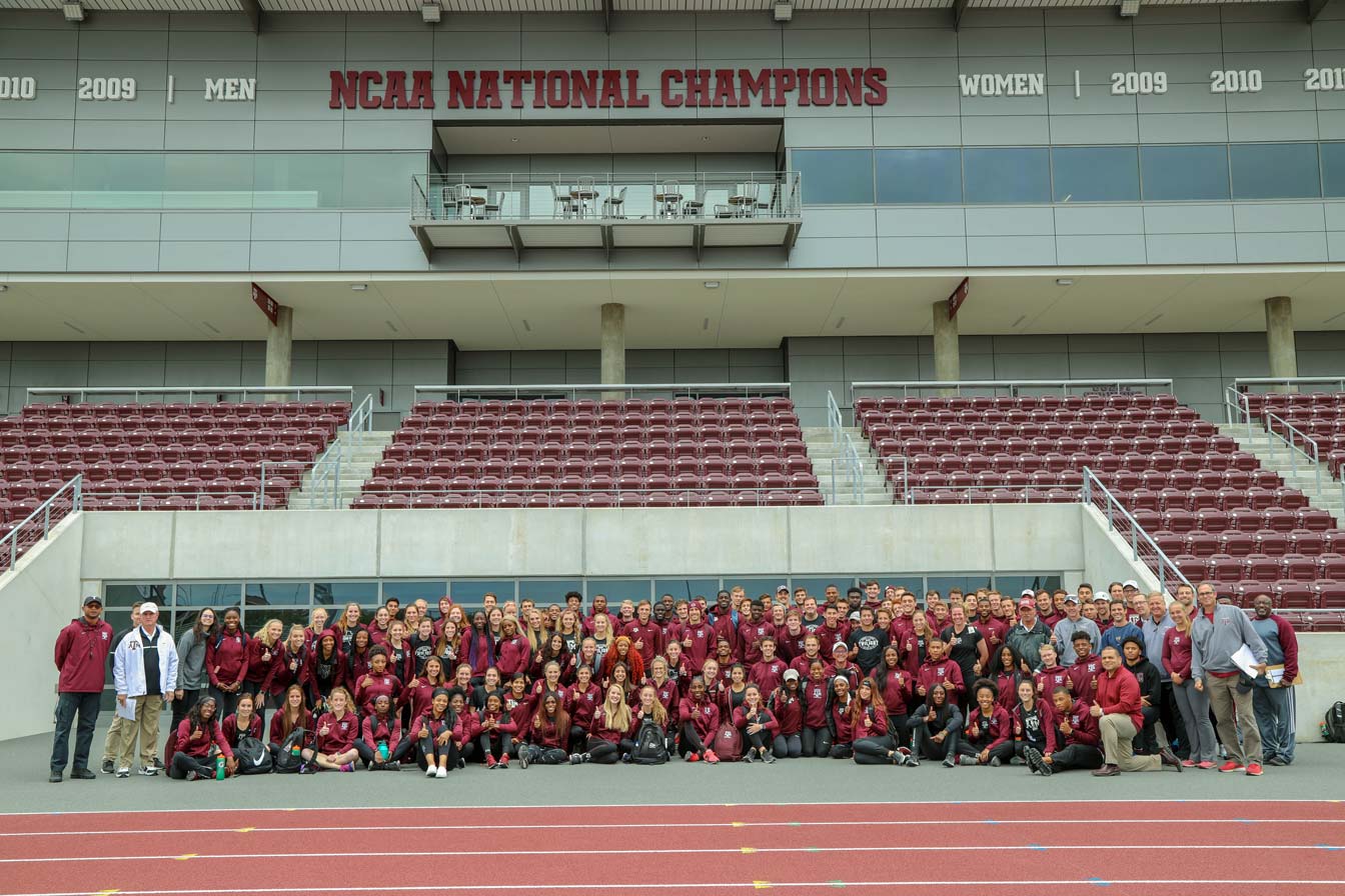 Track and field team posing for group photo