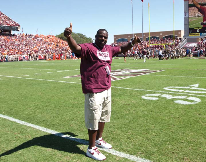D'Andre Hardeman giving thumbs up on the football field