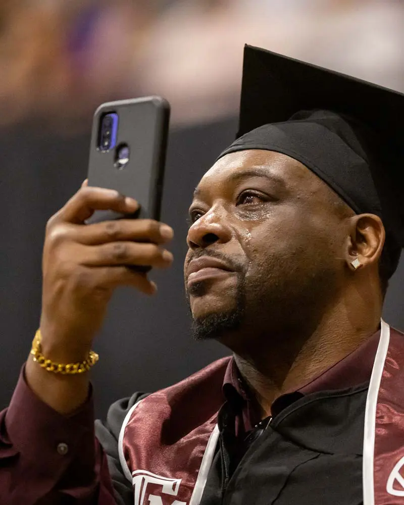 David Coolidge waving flag
