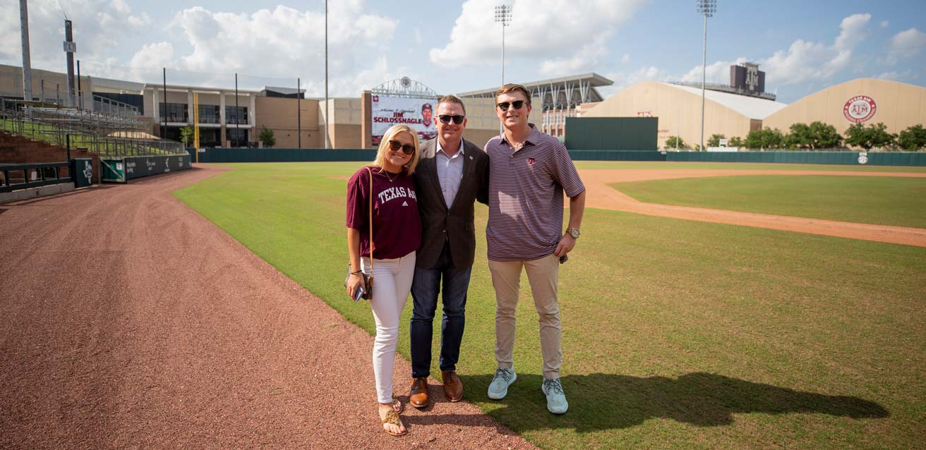 Jim Schlossnagle with his family on the baseball field