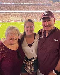 Paula and John Hollowell at a Texas A&M football game